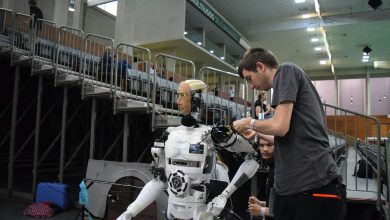 Diagram of a man fixing the machine Feature