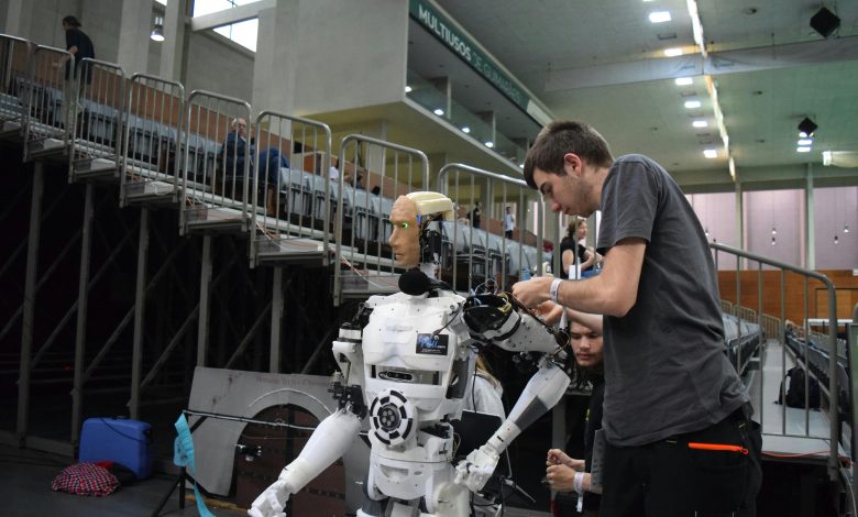 Diagram of a man fixing the machine Feature